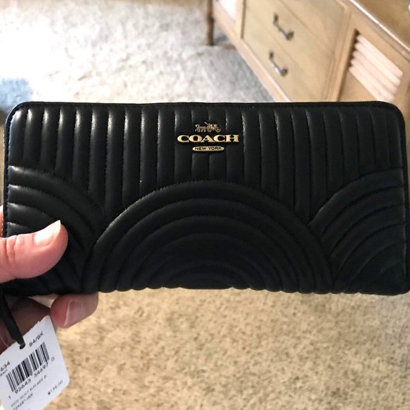 Coach Handbags - Coach Slim Accordion Zip Deco Quilted wallet